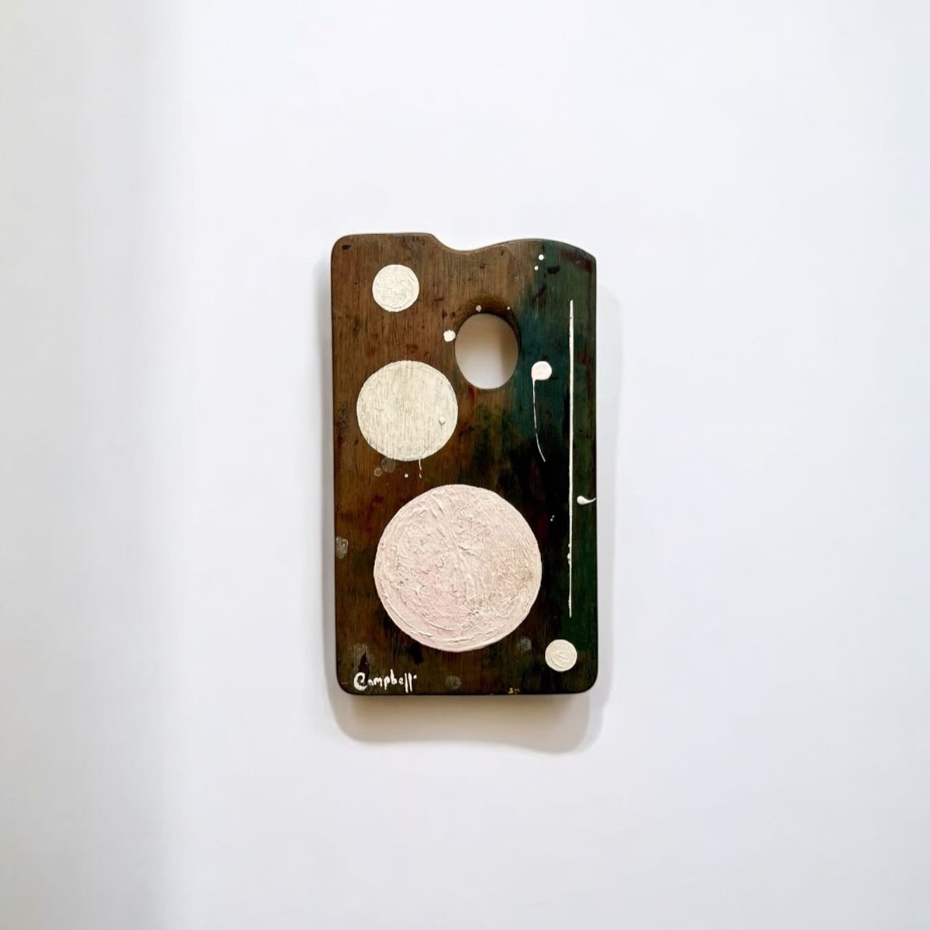 Phone case with circular cutouts on a white background